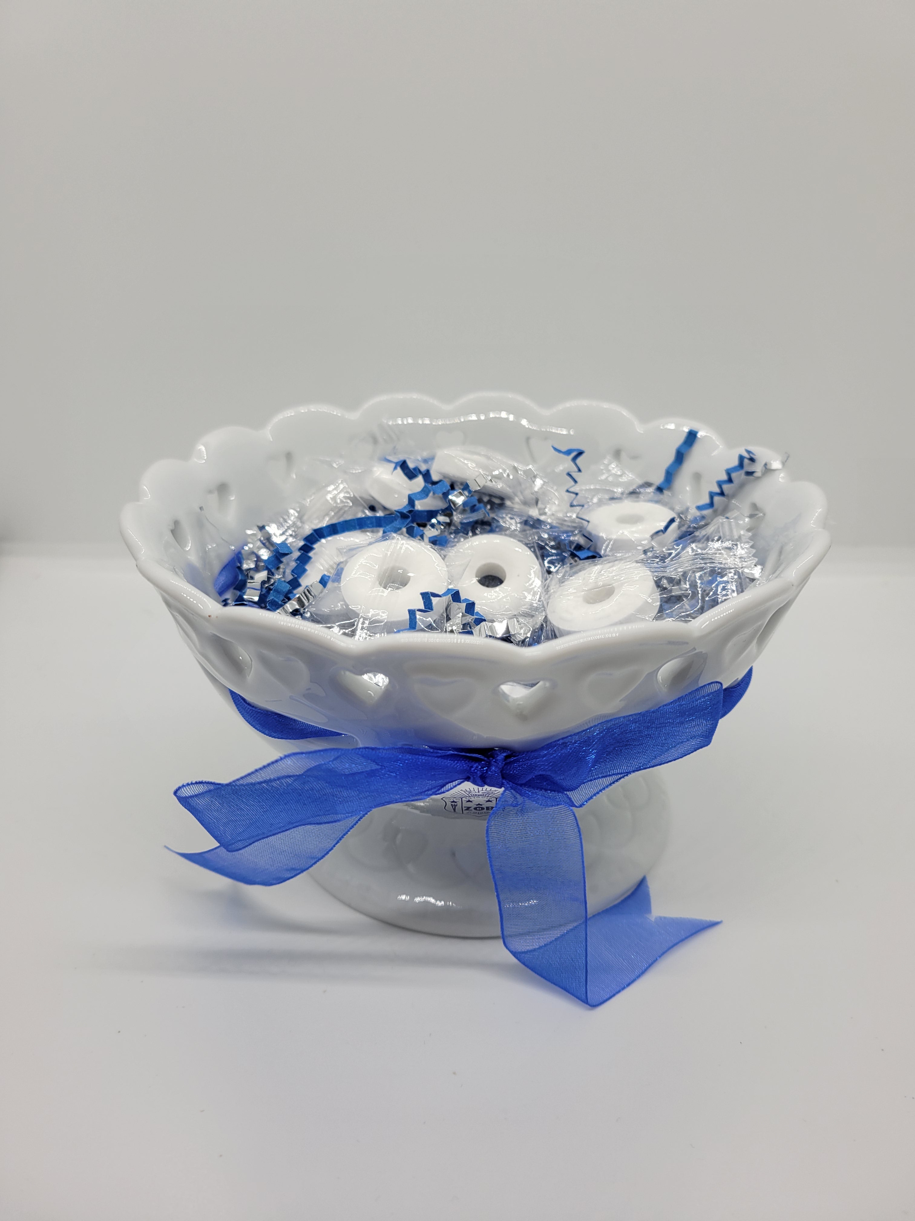 Ceramic candy dish with heart cut outs
