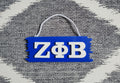 Zeta door hanger