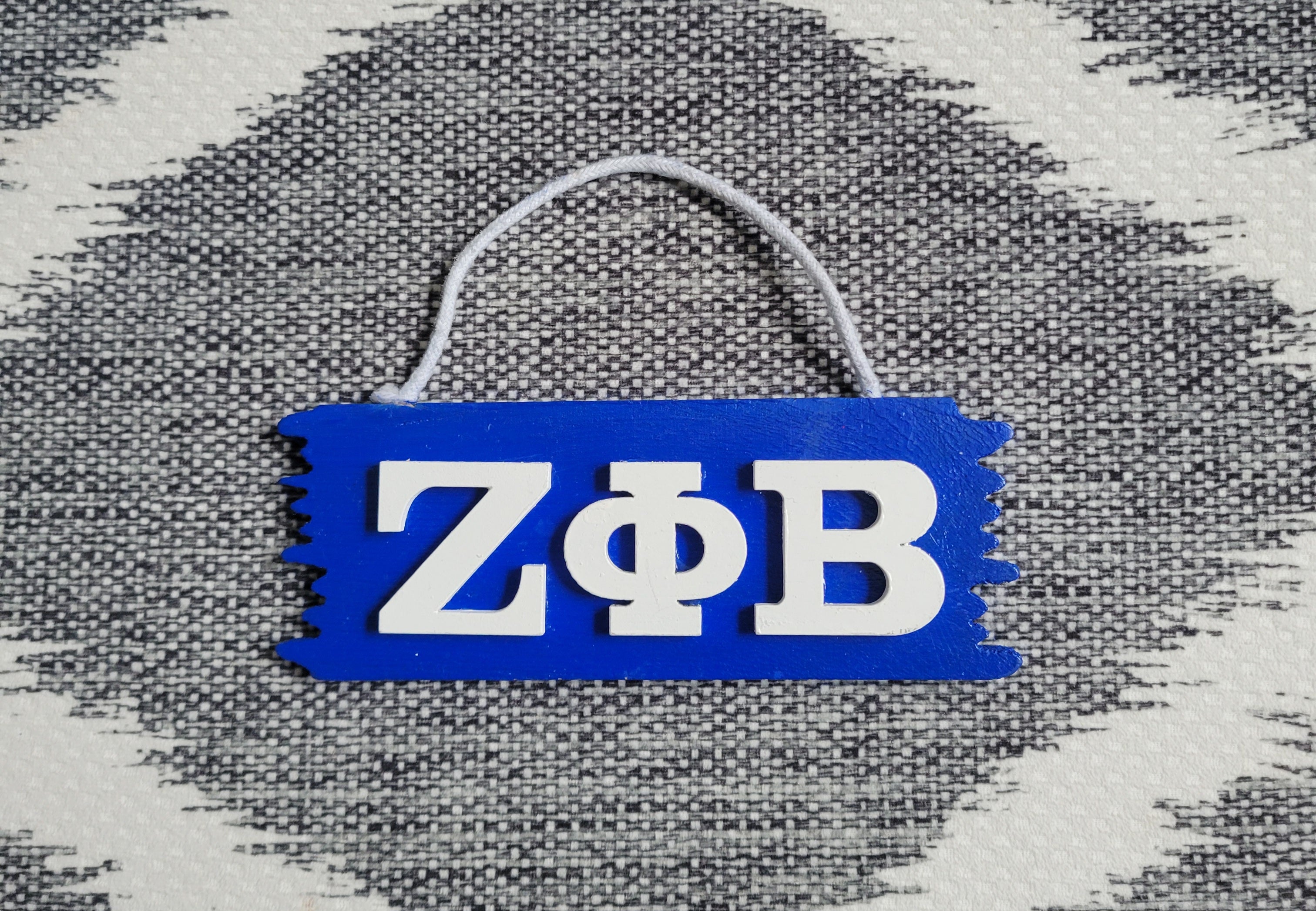 Zeta door hanger