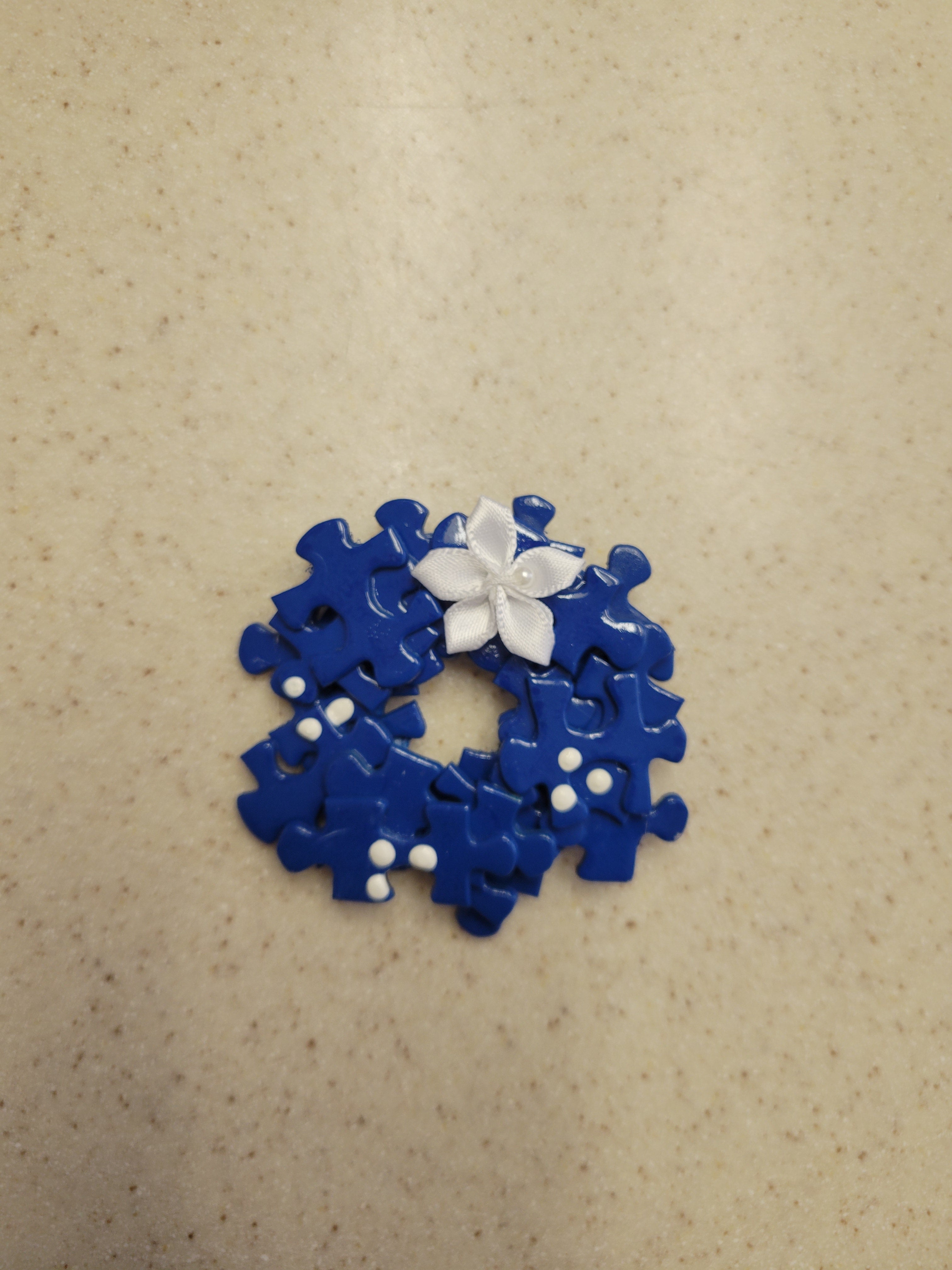 Royal wreath lapel pin