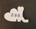 Zeta boots and heart lapel pin