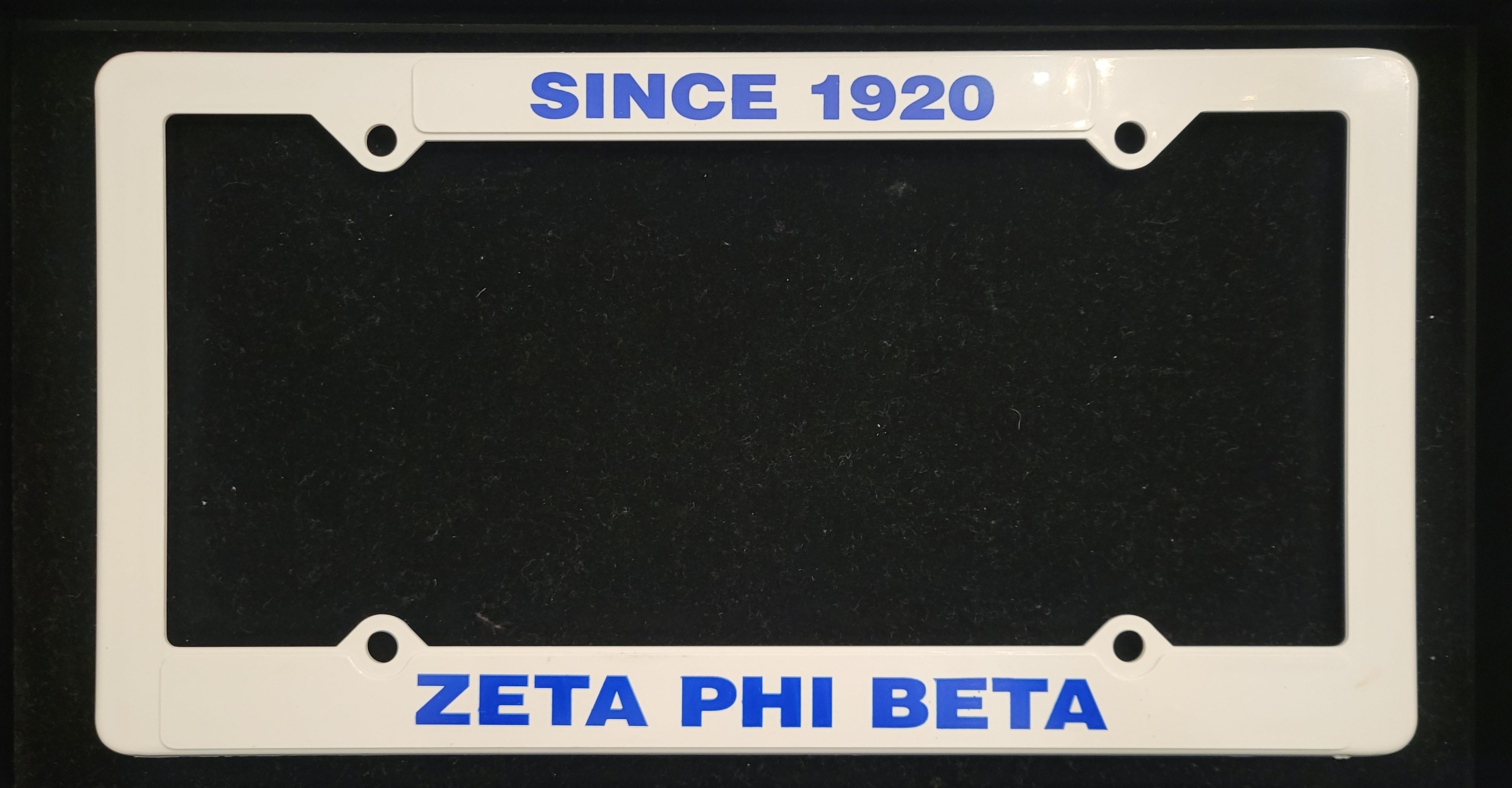 Plastic Zeta license plate holder