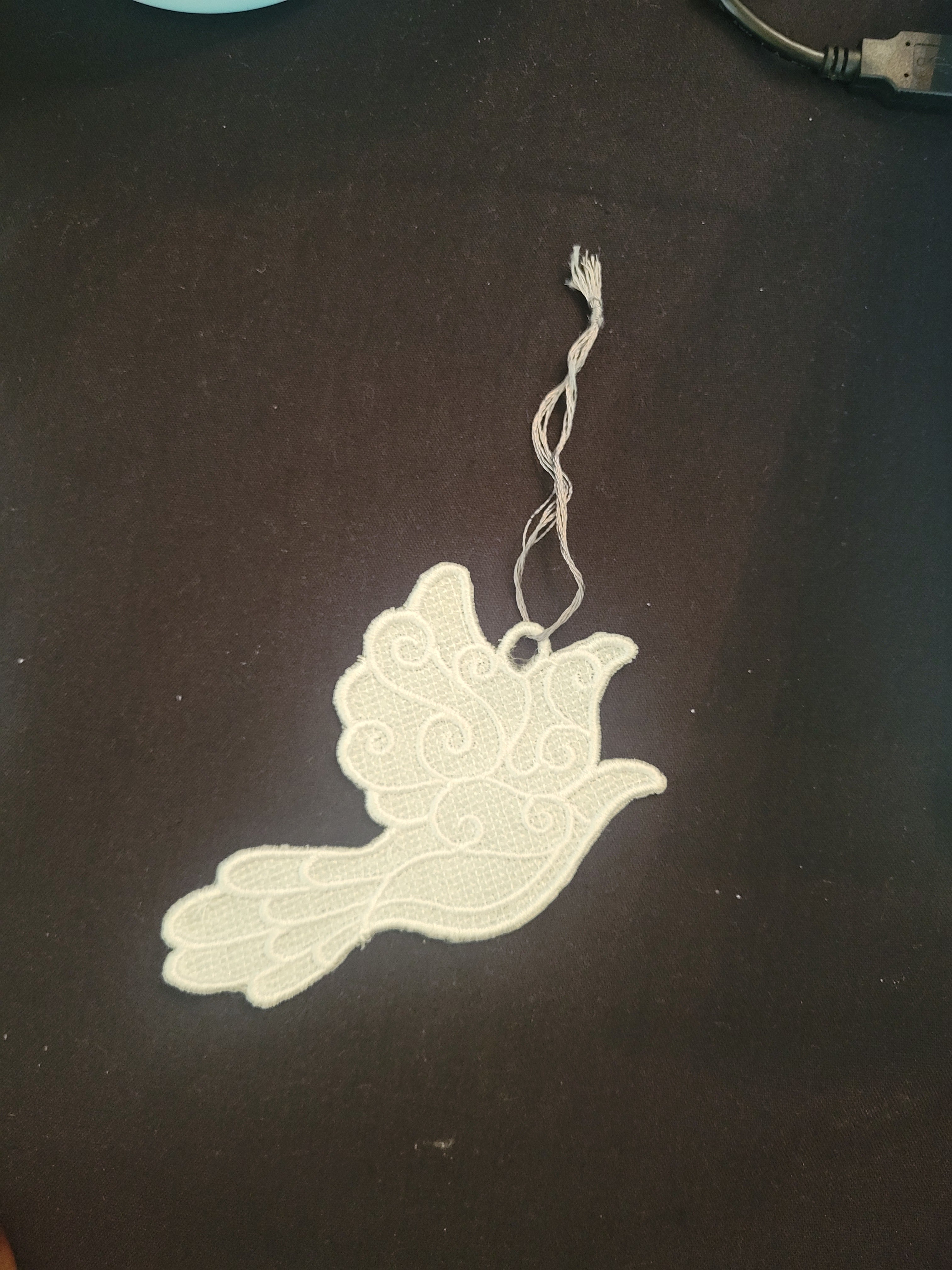 Embroidered dove ornament